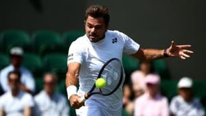 Switzerland's Stan Wawrinka in action during his first round match against Belgium's Ruben Bemelmans.(REUTERS) Switzerland's Stan Wawrinka in action during his first round match against Belgium's Ruben Bemelmans.(REUTERS)