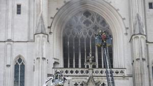 Firefighters are at work to put out a fire at the Saint-Pierre-et-Saint-Paul cathedral in Nantes, western France(AFP) Firefighters are at work to put out a fire at the Saint-Pierre-et-Saint-Paul cathedral in Nantes, western France(AFP)