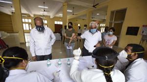 People register at a swab sample collection for coronavirus testing, Gurugram, Haryana.(HT Photo) People register at a swab sample collection for coronavirus testing, Gurugram, Haryana.(HT Photo)