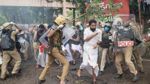 Police baton charge on Bharatiya Janata Yuva Morcha activists who were protesting over Kerala gold smuggling case, in front of the Collectorate in Kozhikode.(PTI) Police baton charge on Bharatiya Janata Yuva Morcha activists who were protesting over Kerala gold smuggling case, in front of the Collectorate in Kozhikode.(PTI)
