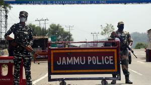 Security personnel stand guard as they keep watch on the Jammu-Srinagar national higway ahead of the Amarnath Yatra, in Jammu on July 17, 2020.(ANI Photo) Security personnel stand guard as they keep watch on the Jammu-Srinagar national higway ahead of the Amarnath Yatra, in Jammu on July 17, 2020.(ANI Photo)