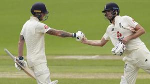 England's Ben Stokes, left, fist bumps teammate Dom Sibley. (AP) England's Ben Stokes, left, fist bumps teammate Dom Sibley. (AP)
