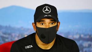 Mercedes' Lewis Hamilton wears a face mask during the post qualifying press conference.(REUTERS) Mercedes' Lewis Hamilton wears a face mask during the post qualifying press conference.(REUTERS)