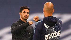 Arsenal manager Mikel Arteta and Manchester City manager Pep Guardiola after the match as play resumes behind closed doors.(REUTERS) Arsenal manager Mikel Arteta and Manchester City manager Pep Guardiola after the match as play resumes behind closed doors.(REUTERS)