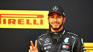 Lewis Hamilton of Great Britain and Mercedes GP celebrates on the podium after winning the Formula One Grand Prix of Styria at Red Bull Ring on July 12, 2020 in Spielberg, Austria. (Photo by Mark Thompson/Getty Images)(Getty Images) Lewis Hamilton of Great Britain and Mercedes GP celebrates on the podium after winning the Formula One Grand Prix of Styria at Red Bull Ring on July 12, 2020 in Spielberg, Austria. (Photo by Mark Thompson/Getty Images)(Getty Images)