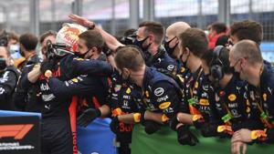 Second placed Red Bull driver Max Verstappen of the Netherlands, left, celebrates with his team after the Hungarian Formula One Grand Prix at the Hungaroring racetrack in Mogyorod, Hungary.(AP) Second placed Red Bull driver Max Verstappen of the Netherlands, left, celebrates with his team after the Hungarian Formula One Grand Prix at the Hungaroring racetrack in Mogyorod, Hungary.(AP)