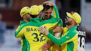 Australia's Mitchell Starc celebrates winning the match by taking the wicket of New Zealand's Mitchell Santner with team mates.(Action Images via Reuters) Australia's Mitchell Starc celebrates winning the match by taking the wicket of New Zealand's Mitchell Santner with team mates.(Action Images via Reuters)