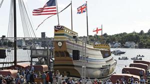 FILE- In this Sept. 7, 2019 file photo, guests come forward to see the Mayflower II afloat after a re-launch ceremony at the Mystic Seaport in Mystic Conn. After undergoing more than three years of major renovations in Connecticut and months of delays due to the COVID-19 pandemic, the replica of the Mayflower is ready to return home.(AP) FILE- In this Sept. 7, 2019 file photo, guests come forward to see the Mayflower II afloat after a re-launch ceremony at the Mystic Seaport in Mystic Conn. After undergoing more than three years of major renovations in Connecticut and months of delays due to the COVID-19 pandemic, the replica of the Mayflower is ready to return home.(AP)