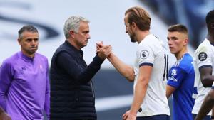 Soccer Football - Premier League - Tottenham Hotspur v Leicester City - Tottenham Hotspur Stadium, London, Britain - July 19, 2020 Tottenham Hotspur manager Jose Mourinho celebrates with Harry Kane after the match, as play resumes behind closed doors following the outbreak of the coronavirus disease (COVID-19) Pool via REUTERS/Richard Heathcote(Pool via REUTERS) Soccer Football - Premier League - Tottenham Hotspur v Leicester City - Tottenham Hotspur Stadium, London, Britain - July 19, 2020 Tottenham Hotspur manager Jose Mourinho celebrates with Harry Kane after the match, as play resumes behind closed doors following the outbreak of the coronavirus disease (COVID-19) Pool via REUTERS/Richard Heathcote(Pool via REUTERS)