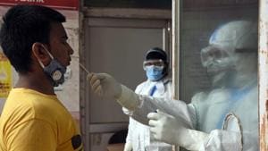 A health worker takes swab sample for Covid-19 test at Sadar Hospital in Ranchi, Jharkhand, on Sunday, July 19, 2020.(ANI) A health worker takes swab sample for Covid-19 test at Sadar Hospital in Ranchi, Jharkhand, on Sunday, July 19, 2020.(ANI)