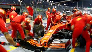 Ferrari’s Sebastian Vettel and mechanics during practice.(Reuters) Ferrari’s Sebastian Vettel and mechanics during practice.(Reuters)