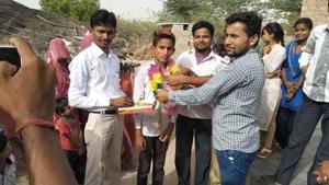 Prakash Fulwariya scored 97% in Class 10.(HT photo) Prakash Fulwariya scored 97% in Class 10.(HT photo)