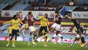Aston Villa's goalkeeper Pepe Reina, right, punches the ball clear of the goal during the English Premier League soccer match between Aston Villa and Arsenal at Villa Park in Birmingham, England, Tuesday, July 21, 2020. (AP Photo/Shaun Botterill,Pool)(AP) Aston Villa's goalkeeper Pepe Reina, right, punches the ball clear of the goal during the English Premier League soccer match between Aston Villa and Arsenal at Villa Park in Birmingham, England, Tuesday, July 21, 2020. (AP Photo/Shaun Botterill,Pool)(AP)