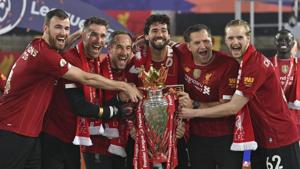 Liverpool's goalkeeper Alisson, center, celebrates with teammates following the English Premier League soccer match between Liverpool and Chelsea at Anfield Stadium in Liverpool.(AP) Liverpool's goalkeeper Alisson, center, celebrates with teammates following the English Premier League soccer match between Liverpool and Chelsea at Anfield Stadium in Liverpool.(AP)