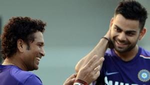 Sachin Tendulkar and Virat Kohli chat during a practice session.(Getty Images) Sachin Tendulkar and Virat Kohli chat during a practice session.(Getty Images)