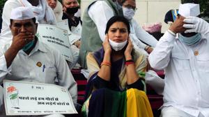 The BJP said the statewide protests by the Congress on Saturday violated prohibitory orders and the Epidemic Disease Act .(ANI) The BJP said the statewide protests by the Congress on Saturday violated prohibitory orders and the Epidemic Disease Act .(ANI)