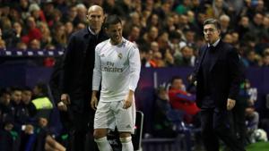 Real Madrid Eden Hazard reacts after he was substituted as coach Zinedine Zidane looks on.(REUTERS) Real Madrid Eden Hazard reacts after he was substituted as coach Zinedine Zidane looks on.(REUTERS)