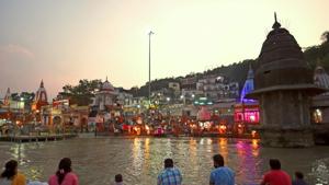 Devotees attend evening prayers at Har Ki Pauri ghat on the banks of the river Ganges, after the government eased a nationwide lockdown imposed as a preventive measure against the Covid-19 coronavirus at Haridwar in Uttarakhand.(AFP) Devotees attend evening prayers at Har Ki Pauri ghat on the banks of the river Ganges, after the government eased a nationwide lockdown imposed as a preventive measure against the Covid-19 coronavirus at Haridwar in Uttarakhand.(AFP)
