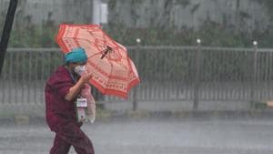 File photo: People deal with rain at Dadar in Mumbai, Maharashtra.(Satish Bate/HT Photo)