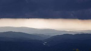 Rain clouds are seen over the Kangra Valley after a rainfall in Dharmsala, India.(AP) Rain clouds are seen over the Kangra Valley after a rainfall in Dharmsala, India.(AP)
