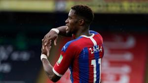 Soccer Football - Premier League - Crystal Palace v Tottenham Hotspur - Selhurst Park, London, Britain - July 26, 2020 Crystal Palace's Wilfried Zaha reacts, as play resumes behind closed doors following the outbreak of the coronavirus disease (COVID-19) Pool via REUTERS/Will Oliver(Pool via REUTERS) Soccer Football - Premier League - Crystal Palace v Tottenham Hotspur - Selhurst Park, London, Britain - July 26, 2020 Crystal Palace's Wilfried Zaha reacts, as play resumes behind closed doors following the outbreak of the coronavirus disease (COVID-19) Pool via REUTERS/Will Oliver(Pool via REUTERS)