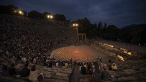 Spectators sit at the ancient theater of Epidaurus, during a concert, on Friday, July 17, 2020. (AP Photo/Petros Giannakouris) Spectators sit at the ancient theater of Epidaurus, during a concert, on Friday, July 17, 2020. (AP Photo/Petros Giannakouris)