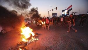 Protesters burn tires during a demonstration demanding better public services and jobs in Basra, southeast of Baghdad, Iraq on Monday.(AP Photo) Protesters burn tires during a demonstration demanding better public services and jobs in Basra, southeast of Baghdad, Iraq on Monday.(AP Photo)