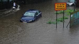 Vehicle seen on closed road due water logging after heavy rain at Manpada junction Ghodbunder road at Thane, Mumbai.(Praful Gangurde/HTPhoto) Vehicle seen on closed road due water logging after heavy rain at Manpada junction Ghodbunder road at Thane, Mumbai.(Praful Gangurde/HTPhoto)
