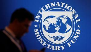 A participant stands near a logo of IMF at the International Monetary Fund. The IMF in April doubled its emergency lending capacity to $100 billion.(REUTERS) A participant stands near a logo of IMF at the International Monetary Fund. The IMF in April doubled its emergency lending capacity to $100 billion.(REUTERS)