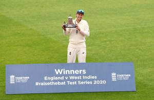 England's Joe Root celebrates winning the test series as he poses with the Wisden trophy, as play resumes behind closed doors following the outbreak of the coronavirus disease (COVID-19).(REUTERS) England's Joe Root celebrates winning the test series as he poses with the Wisden trophy, as play resumes behind closed doors following the outbreak of the coronavirus disease (COVID-19).(REUTERS)