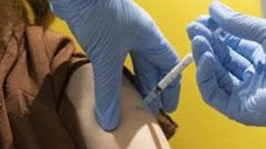 University of Oxford a volunteer participates in the vaccine trial in Oxford, England.(AP) University of Oxford a volunteer participates in the vaccine trial in Oxford, England.(AP)