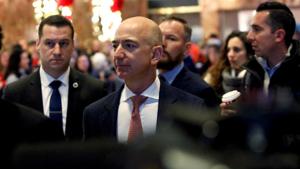 Jeff Bezos, founder, chairman, and chief executive officer of Amazon.com enters Trump Tower ahead of a meeting of technology leaders with President-elect Donald Trump in Manhattan, New York City, US.(REUTERS) Jeff Bezos, founder, chairman, and chief executive officer of Amazon.com enters Trump Tower ahead of a meeting of technology leaders with President-elect Donald Trump in Manhattan, New York City, US.(REUTERS)