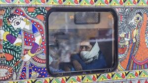 A passenger onboard a train at New Delhi Railway Station.(PTI) A passenger onboard a train at New Delhi Railway Station.(PTI)
