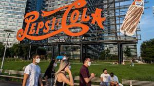 People try to maintain social distance while enjoying a warm and humid day at Gantry Plaza State Park following the outbreak of the coronavirus disease (COVID-19), in Long Island City, New York, U.S.(REUTERS File) People try to maintain social distance while enjoying a warm and humid day at Gantry Plaza State Park following the outbreak of the coronavirus disease (COVID-19), in Long Island City, New York, U.S.(REUTERS File)