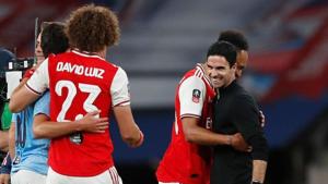 Arsenal's Pierre-Emerick Aubameyang, David Luiz and manager Mikel Arteta(REUTERS) Arsenal's Pierre-Emerick Aubameyang, David Luiz and manager Mikel Arteta(REUTERS)