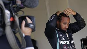 Mercedes driver Lewis Hamilton of Britain, right, after he clocked the fastest time during the qualifying session for the British Formula One Grand Prix at the Silverstone racetrack.(AP) Mercedes driver Lewis Hamilton of Britain, right, after he clocked the fastest time during the qualifying session for the British Formula One Grand Prix at the Silverstone racetrack.(AP)