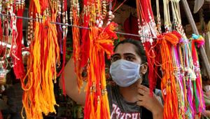 A girl purchasing rakhis at Phase 11 in Mohali.(Gurminder Singh/Hindustan Times) A girl purchasing rakhis at Phase 11 in Mohali.(Gurminder Singh/Hindustan Times)