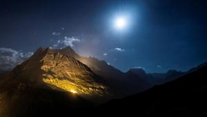 The mountain chains of Veisivi and Dent de Perroc are illuminated by 100 kg of the magnesium powder to celebrate Swiss National Day following the coronavirus disease (COVID-19) outbreak in Ferpecle near Evolene in the Val d'Herens, Switzerland July 31, 2020.(Louis Dasselborne/Office du Tourisme Evolene/Handout via REUTERS) The mountain chains of Veisivi and Dent de Perroc are illuminated by 100 kg of the magnesium powder to celebrate Swiss National Day following the coronavirus disease (COVID-19) outbreak in Ferpecle near Evolene in the Val d'Herens, Switzerland July 31, 2020.(Louis Dasselborne/Office du Tourisme Evolene/Handout via REUTERS)