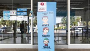 A notice prohibiting students with fever, cough and cold from entering school is displayed at SISB Pcl's school in Bangkok, Thailand.(Bloomberg)
