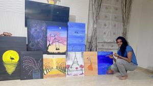 PV Sindhu with her paintings.(Special Arrangement) PV Sindhu with her paintings.(Special Arrangement)