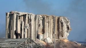 Grain spills from a damaged wheat silos in the Port of Beirut in Beirut, Lebanon, on Wednesday. A massive explosion at Lebanon’s main port rocked Beirut, overwhelming hospitals dealing with the injured and dying.(Bloomberg) Grain spills from a damaged wheat silos in the Port of Beirut in Beirut, Lebanon, on Wednesday. A massive explosion at Lebanon’s main port rocked Beirut, overwhelming hospitals dealing with the injured and dying.(Bloomberg)