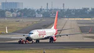 A SpiceJet plane prepares to take-off from Chennai airport for domestic travel, after flights resumed during the ongoing nationwide lockdown, in Chennai.(PTI) A SpiceJet plane prepares to take-off from Chennai airport for domestic travel, after flights resumed during the ongoing nationwide lockdown, in Chennai.(PTI)