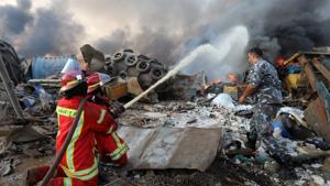 Firefighters spray water at a fire following an explosion in Beirut's port area, Lebanon(REUTERS) Firefighters spray water at a fire following an explosion in Beirut's port area, Lebanon(REUTERS)