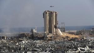 A Lebanese army helicopter flies over the scene where an explosion hit the seaport of Beirut, Lebanon, Wednesday, Aug. 5, 2020.(AP) A Lebanese army helicopter flies over the scene where an explosion hit the seaport of Beirut, Lebanon, Wednesday, Aug. 5, 2020.(AP)