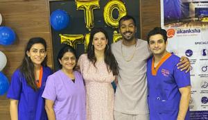 Hardik Pandya and Natasa Stankovic with doctors and staff at the hospital. Hardik Pandya and Natasa Stankovic with doctors and staff at the hospital.
