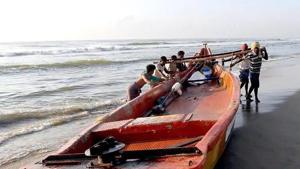 The boat was caught in the rough sea because of the prevailing inclement weather.(HT file photo for representation) The boat was caught in the rough sea because of the prevailing inclement weather.(HT file photo for representation)