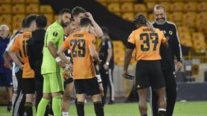Wolverhampton Wanderers' head coach Nuno Espirito Santo, right, reacts with Adama Traore after the Europa League round of 16 second leg soccer match between Wolves and Olympiakos at Molineux Stadium.(AP) Wolverhampton Wanderers' head coach Nuno Espirito Santo, right, reacts with Adama Traore after the Europa League round of 16 second leg soccer match between Wolves and Olympiakos at Molineux Stadium.(AP)