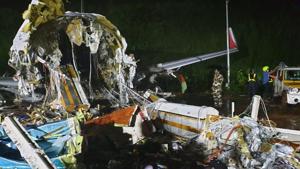 One half of the Air India repatriation flight lies among the debris in Kozhikode, Kerala.(HT Photos) One half of the Air India repatriation flight lies among the debris in Kozhikode, Kerala.(HT Photos)