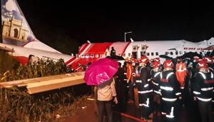 Kozhikode: Rescue operation underway after an Air India Express flight with passengers on board en route from Dubai skidded off the runway while landing at Karippur in Kozhikode on Friday.(PTI) Kozhikode: Rescue operation underway after an Air India Express flight with passengers on board en route from Dubai skidded off the runway while landing at Karippur in Kozhikode on Friday.(PTI)