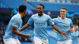 Manchester City's Raheem Sterling celebrates scoring their first goal with teammates.(Pool via REUTERS) Manchester City's Raheem Sterling celebrates scoring their first goal with teammates.(Pool via REUTERS)